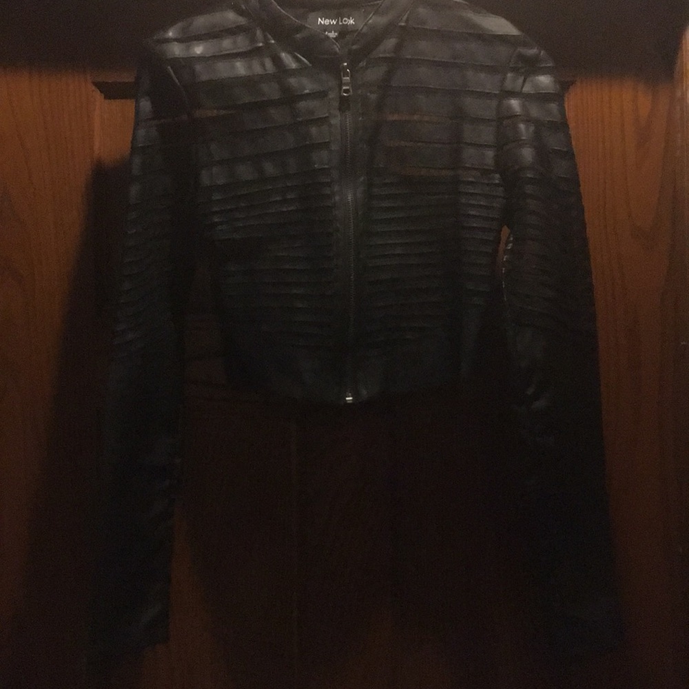 Crop faux leather and sheer accent jacket.